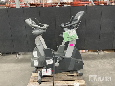 (2) Assorted Life Fitness Exercise Bikes