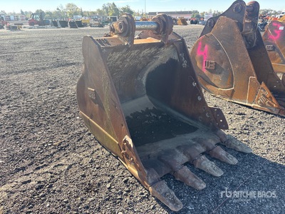 Cat 52 in Excavator Bucket