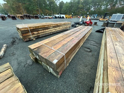 Quantity of (8) 10 in x 12 in x 20 Ft Pressure Treated Lumber
