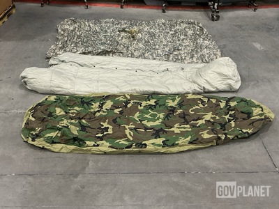 (10) Sleeping Bags, (28) Wet Weather Ponchos & Assorted Items