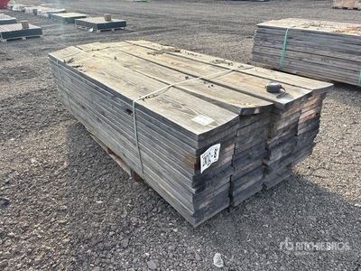 Quantity of (64) 2 in x 12 in x 8 ft SYP Lumber