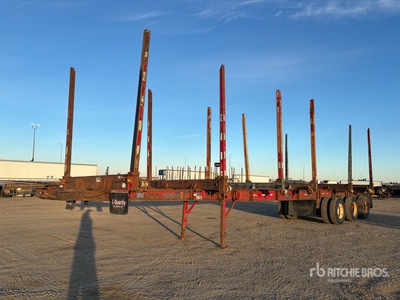 1999 Advance 48 ft Tri/A Hayrack Log Trailer