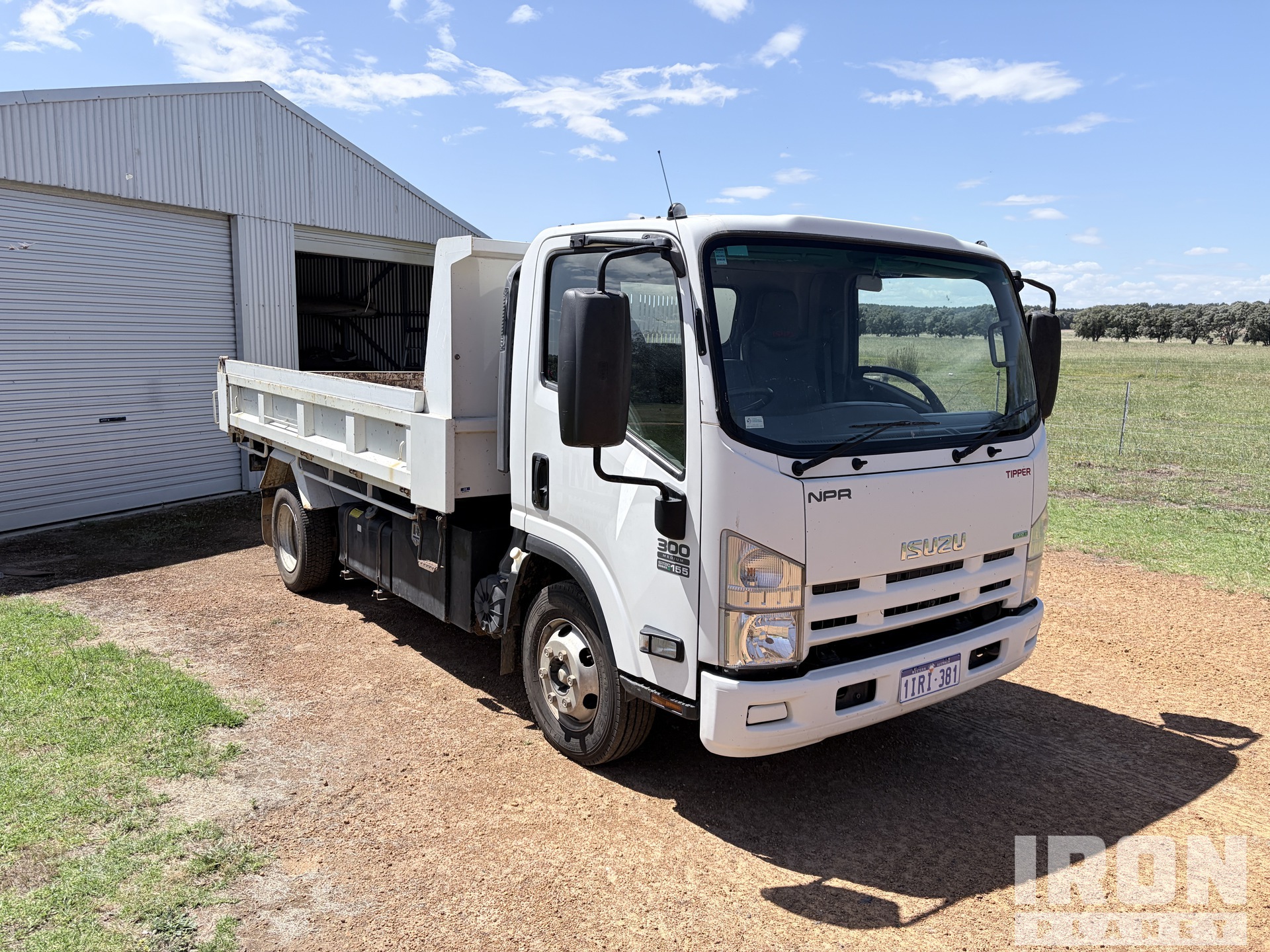 2015 Isuzu NPR300 4x2 S/A Dump Truck