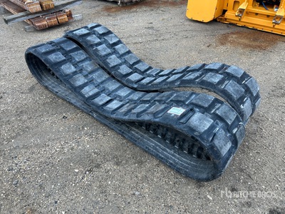Quantity of (2) Skid Steer Tracks (Unused) - Fits Caterpillar 299
