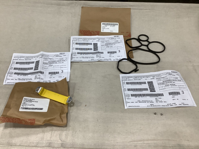 (134) Shims, (18) Machine Screws, (9) Gaskets & Assorted Parts