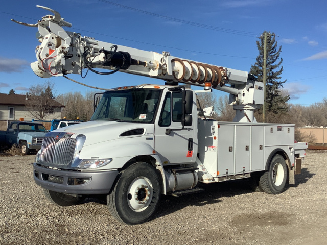 Altec DM47BBR Digger Derrick on 2013 International 4300 S/A Truck