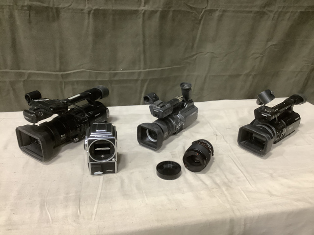 (6) Assorted Video Cameras, Still Picture Camera & Cap Lens