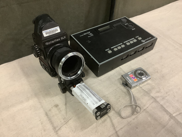 (1) Video Test Generator, (1) SLR Camera & Assorted Electronics