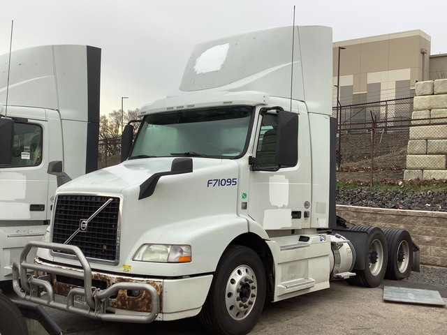 2015 Volvo VNM 6x4 T/A Day Cab Truck Tractor 2015 Volvo VNM 6x4 T/A Day Cab Truck Tractor